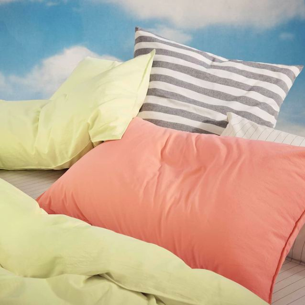 cosy pillows and cushions on a bed